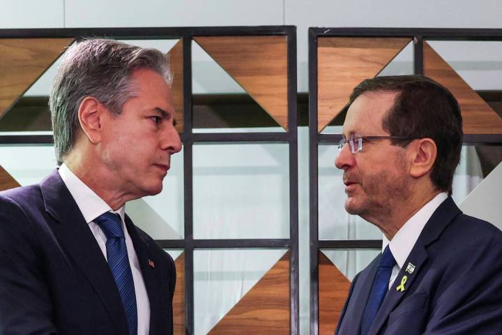 U.S. Secretary of State Antony Blinken, left, meets with Israel's President Isaac Herzog, in Te ...