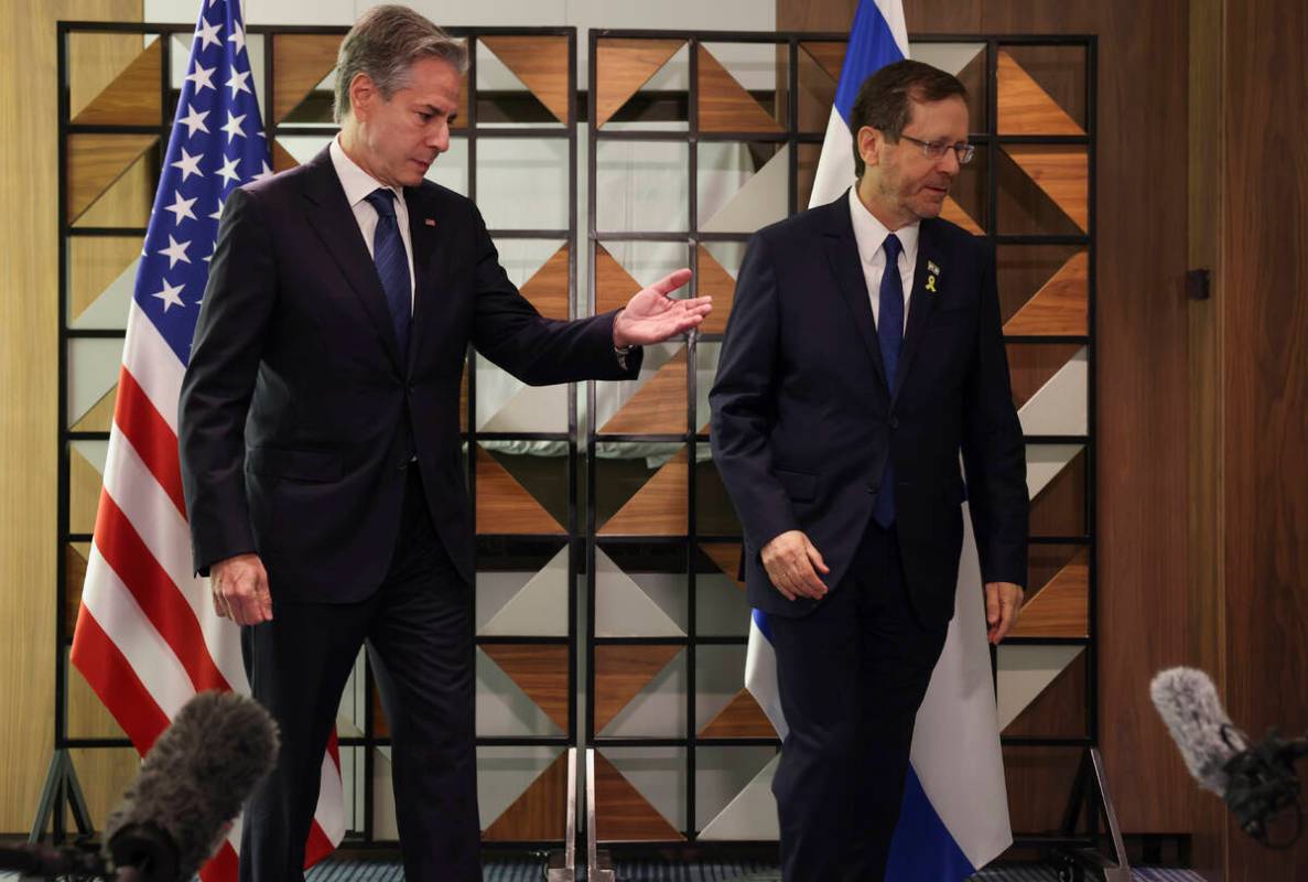 U.S. Secretary of State Antony Blinken, left, meets with Israel's President Isaac Herzog, in Te ...