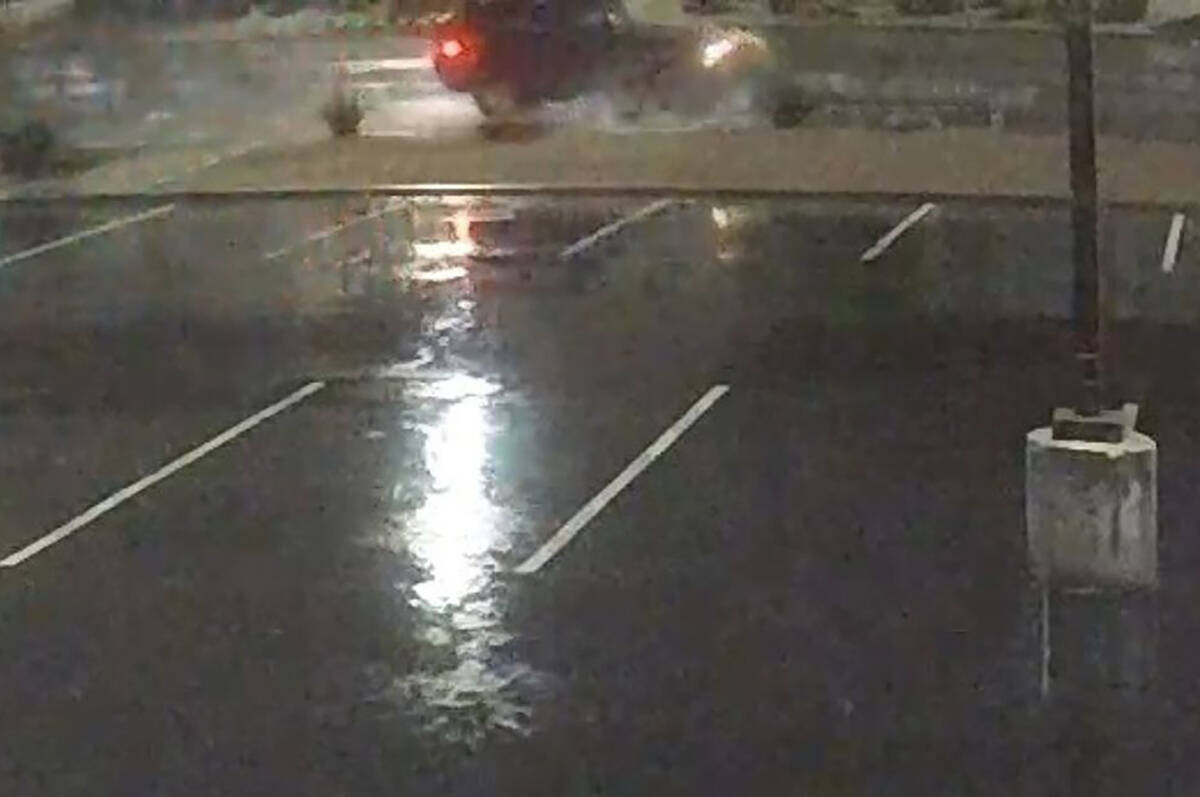 A surveillance photo shows the suspected Jeep involved in a fatal hit-and-run auto-pedestrian c ...