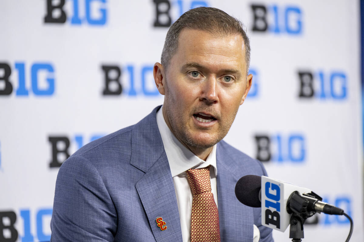 Southern California head coach Lincoln Riley talks with reporters during an NCAA college footba ...