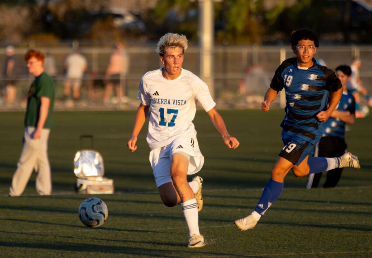 Sierra Vista defender Lucas Rossetti (17) compete for the ball during the high school soccer ga ...