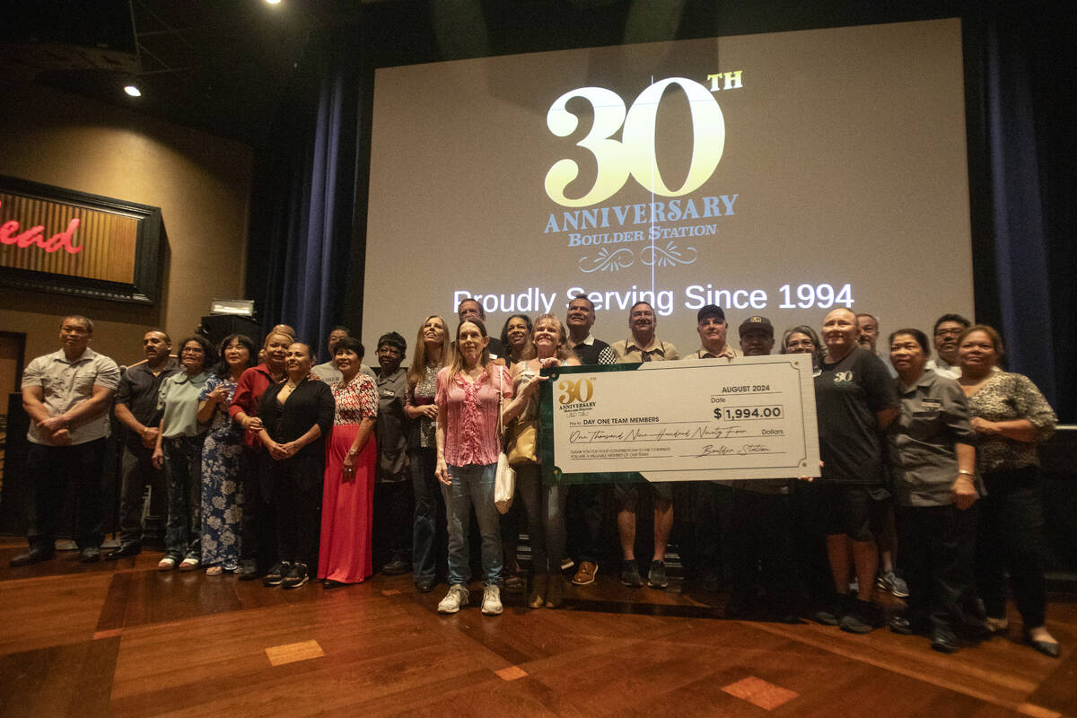 Boulder Station’s 39 day-one team members pose for a group photograph after they each re ...