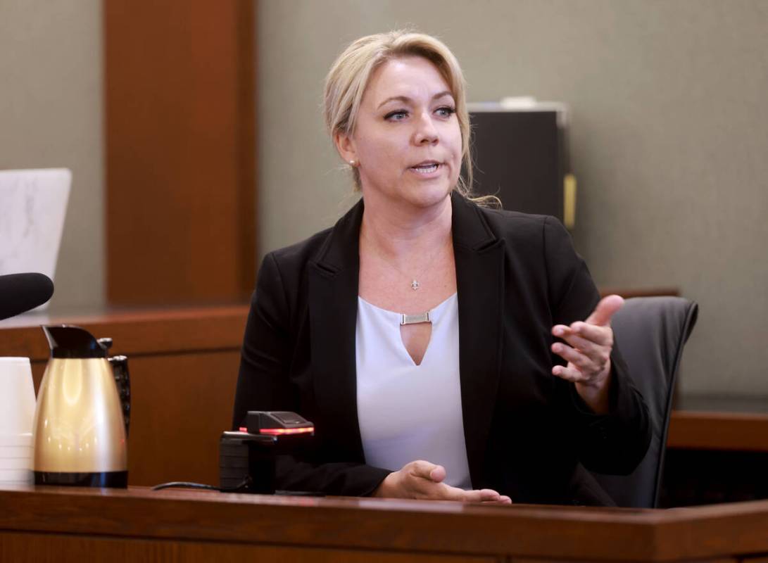 Las Vegas police Detective Justine Gatus testifies on the witness stand during the murder trial ...