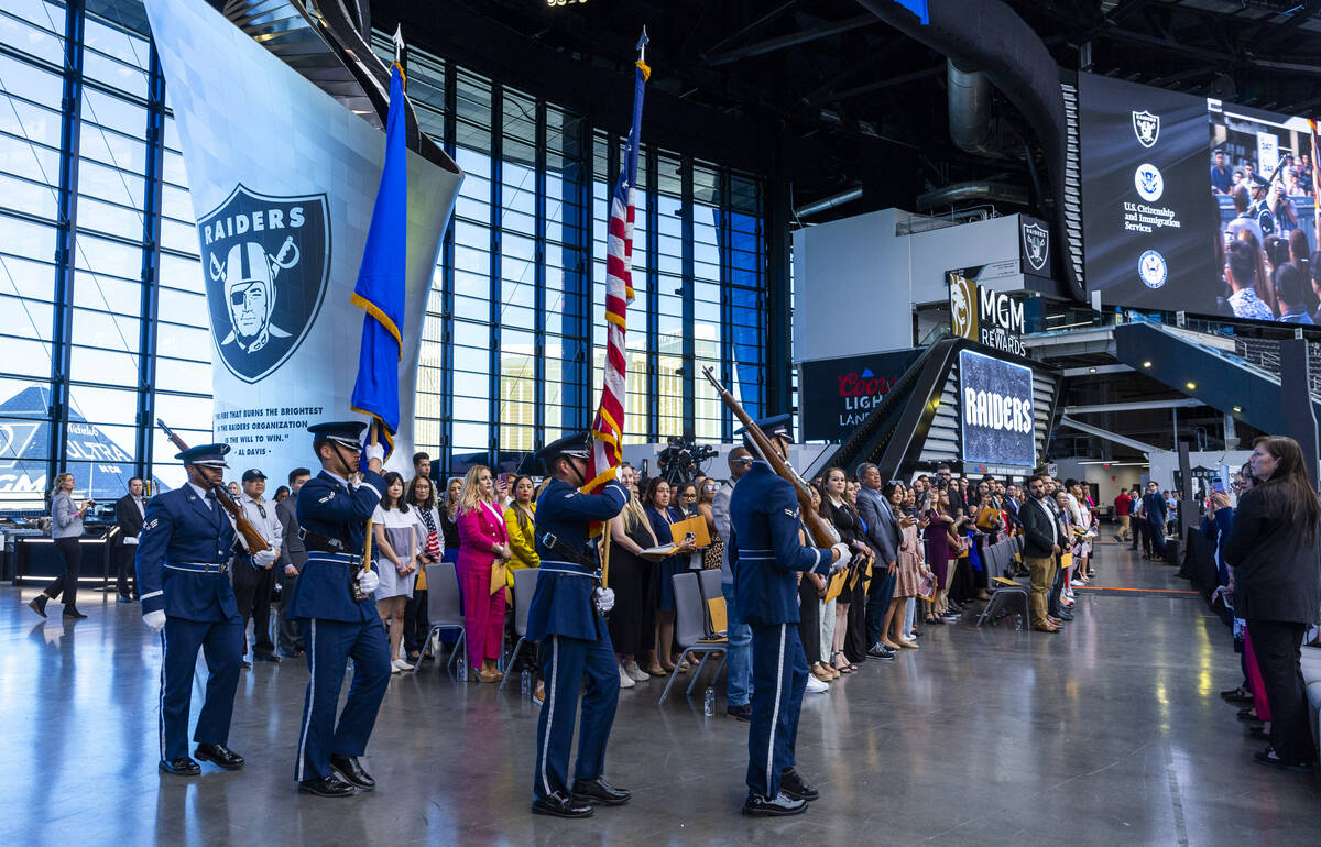 The Nellis Air Force Base Honor Guard presents the colors during a naturalization ceremony at A ...