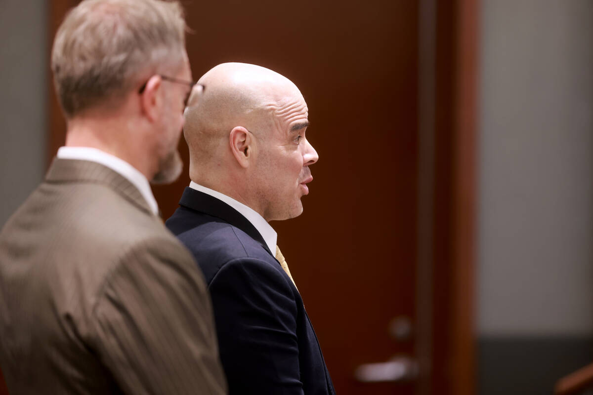 Robert Telles, right, acknowledges the judge’s advisement on the right to testify in his ...