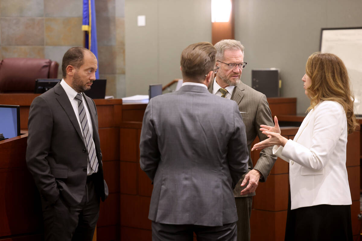 From left, Chief Deputy District Attorney Christopher Hamner, defense attorney Michael Horvath, ...