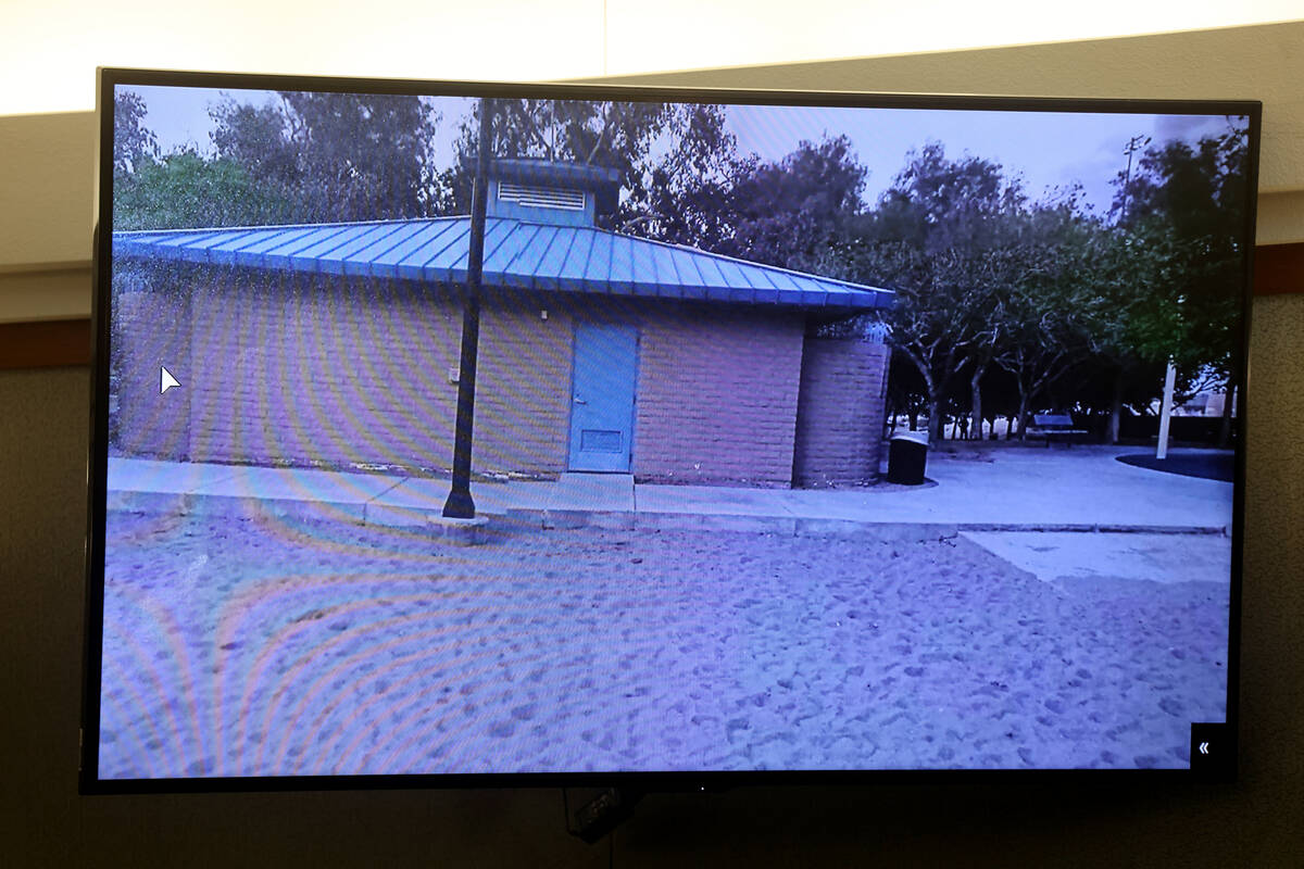 A photo of the bathroom building at Bruce Trent Park is shown in court as Tracy Migliore testif ...