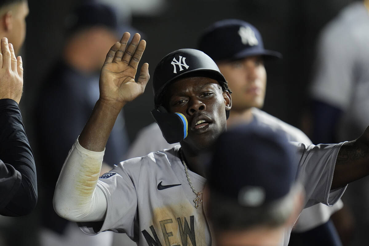 New York Yankees' Jazz Chisholm Jr. celebrates after scoring on a single by Anthony Volpe durin ...