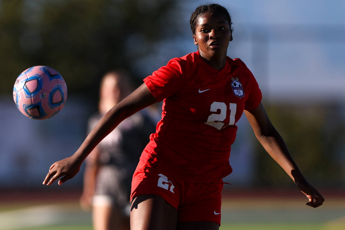 Coronado forward Jazmine McCallum eyes the ball during a high school soccer game against Arbor ...