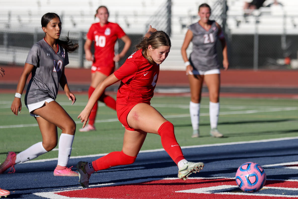 Coronado defender Ella Schultz kicks to score on Arbor View during a high school soccer game on ...