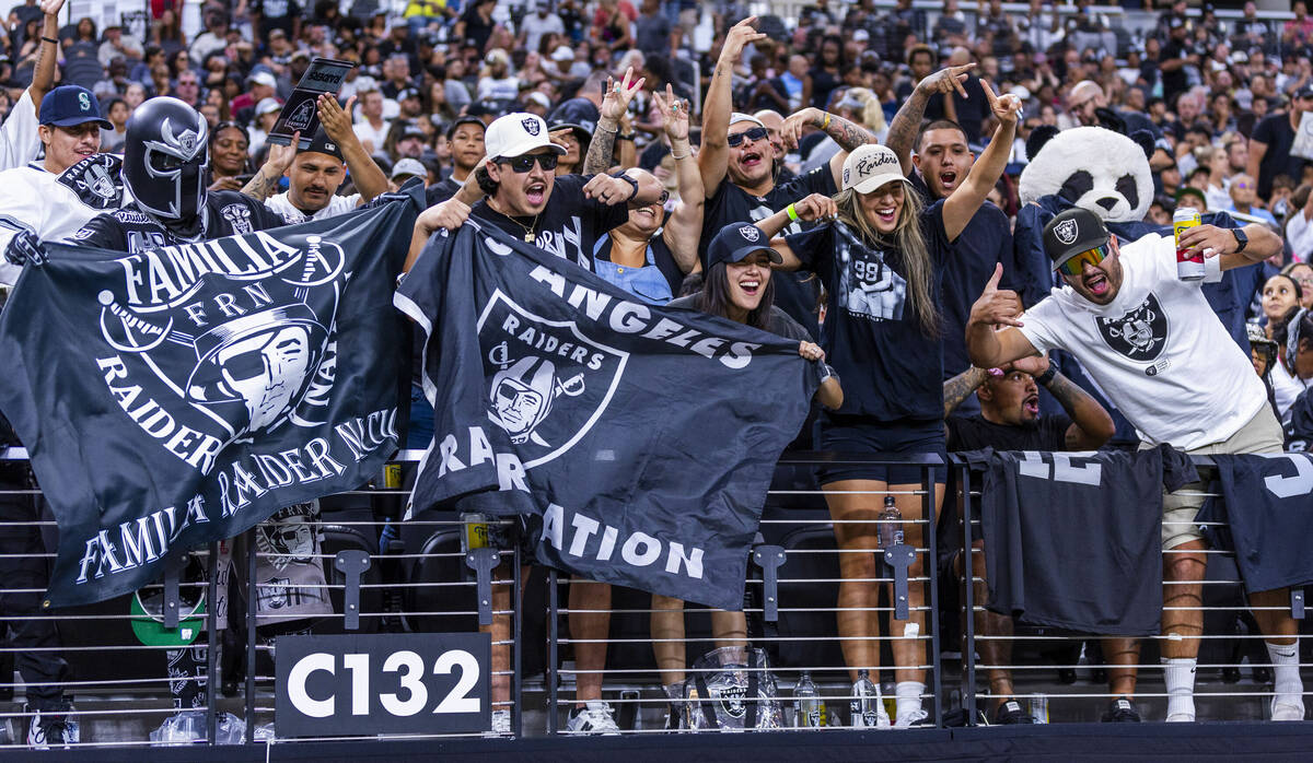 Raiders fans cheer for the team during an open practice at Allegiant Stadium on Tuesday, Aug. 2 ...