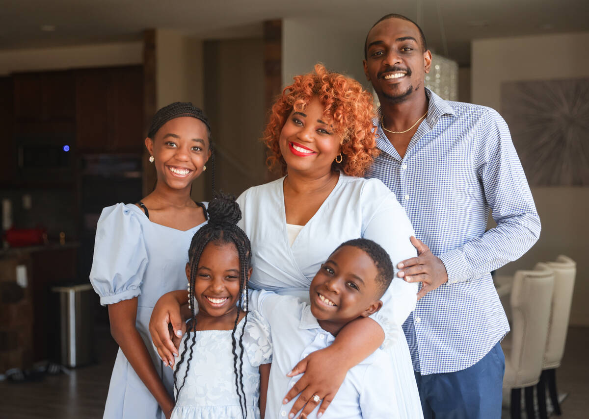 Rosemary Wade, a stroke survivor, center, poses for a portrait with her children, from left: Se ...