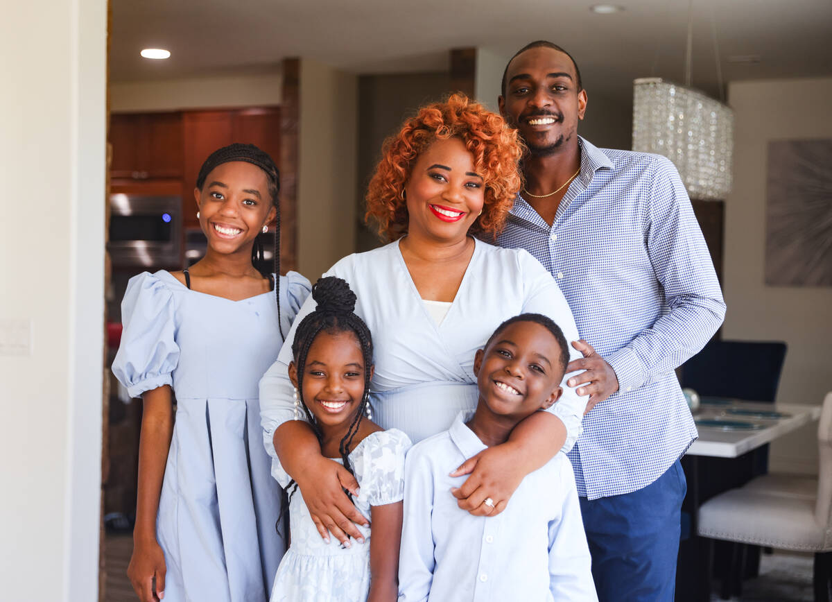 Rosemary Wade, a stroke survivor, center, poses for a portrait with her children, from left: Se ...