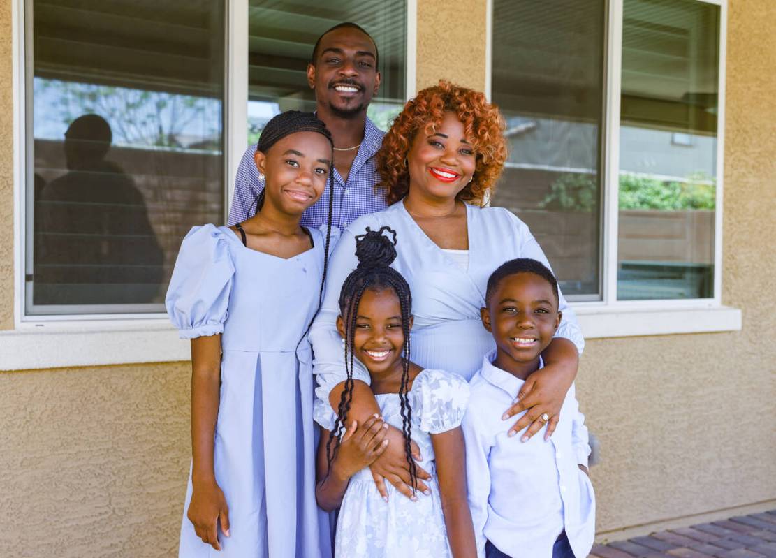 Rosemary Wade, a stroke survivor, center, poses for a portrait with her children, from left: Se ...