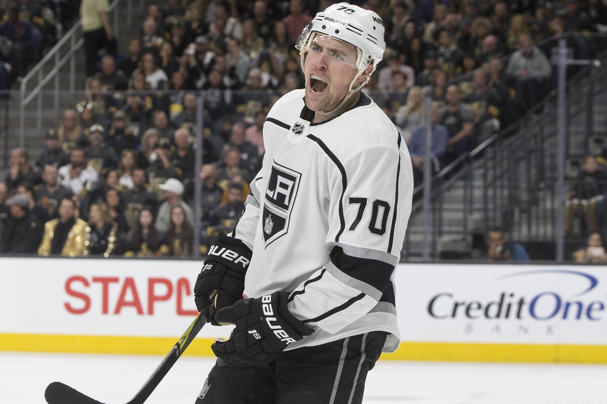 Los Angeles Kings left wing Tanner Pearson (70) celebrates after teammate Paul LaDue (38) score ...