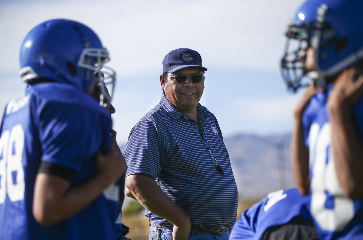 Football coach Richard Egan leads practice at McDermitt High School in McDermitt on Tuesday, Se ...