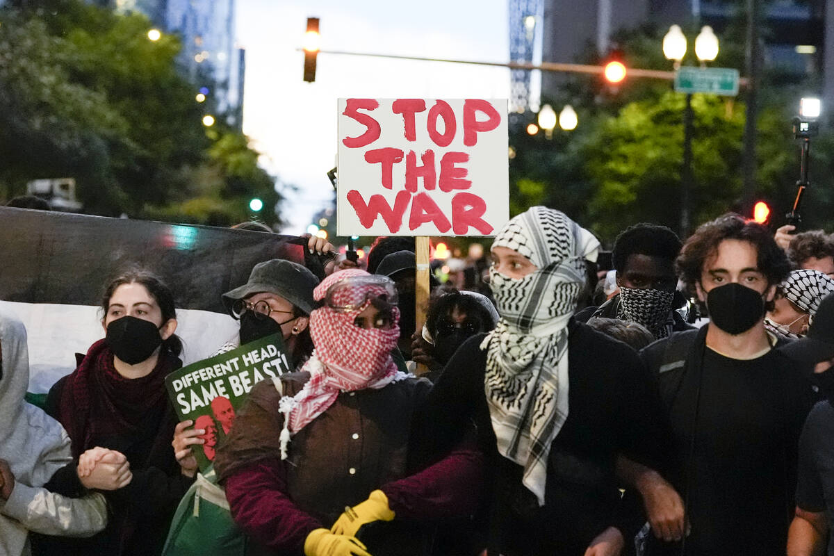 Protesters demonstrate near the Israeli Consulate during the Democratic National Convention Tue ...