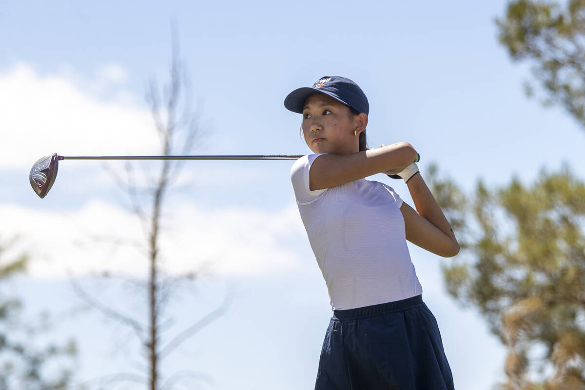 Coronado’s Grace Oh watches her ball drive down the fairway during the 5A Desert League ...