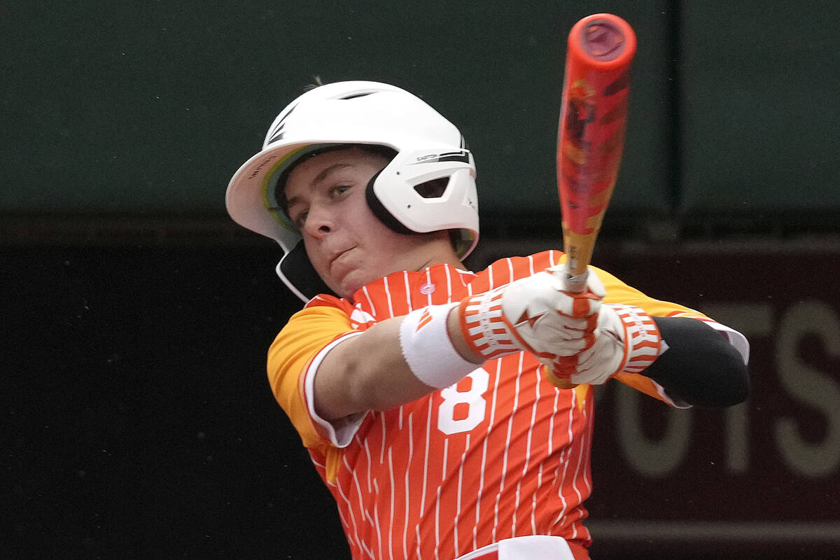 Boerne, Texas' Gray Collins (8) hits a double off Henderson, Nev.'s Wyatt Erickson, driving in ...