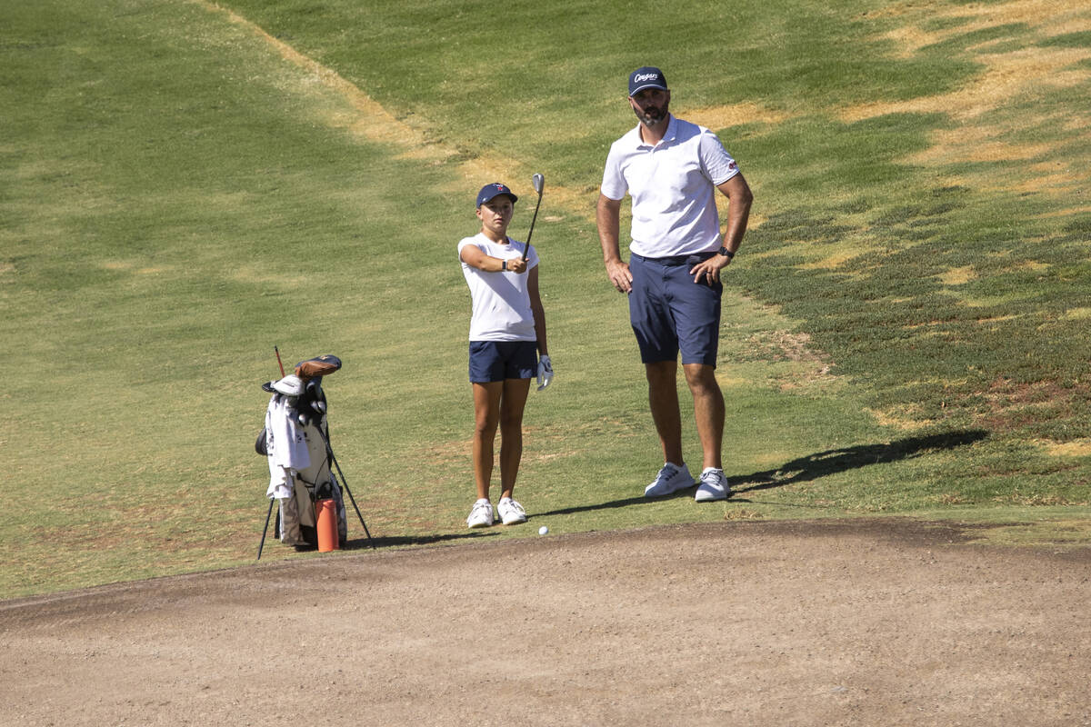 Coronado’s Alexa Hart, left, and Head Coach Rusty Anderson, right, discuss the next shot ...