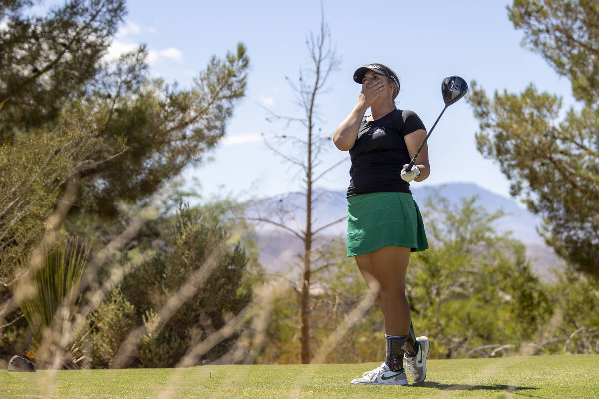 Palo Verde’s Sage Parry reacts after driving her ball during the 5A Desert League girls ...