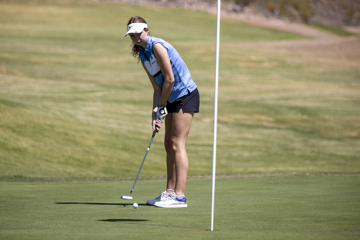 Centennial’s Mia Meyers putts her ball during the 5A Desert League girls golf match at T ...