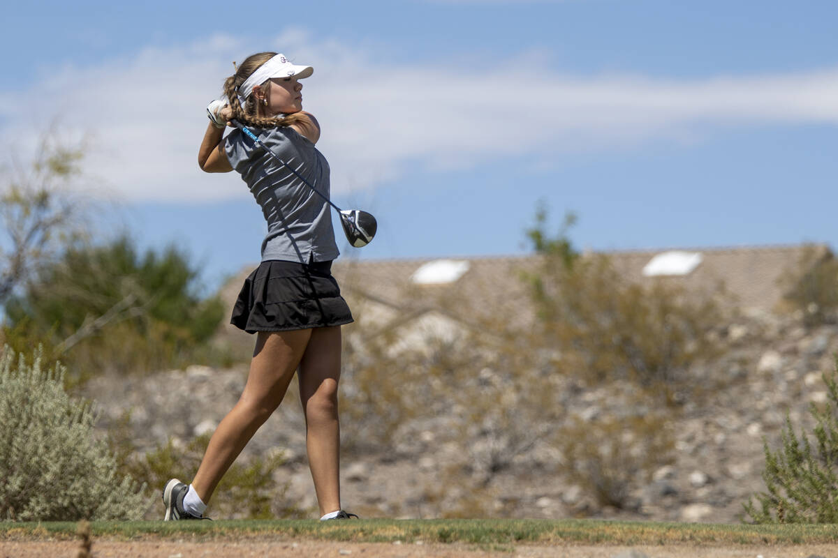 Faith Lutheran’s Maddie Perez watches her ball drive down the fairway during the 5A Dese ...