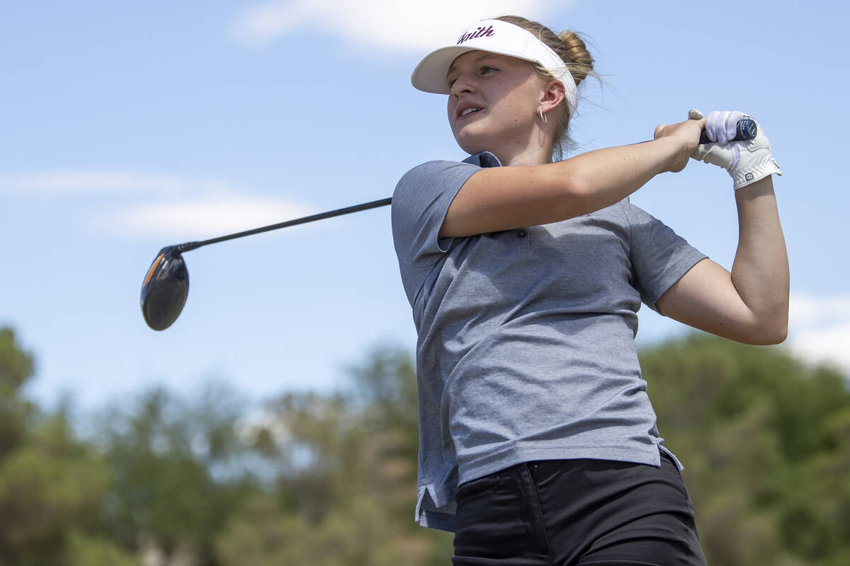 Faith Lutheran’s Lisa Harding watches her ball drive down the fairway during the 5A Dese ...