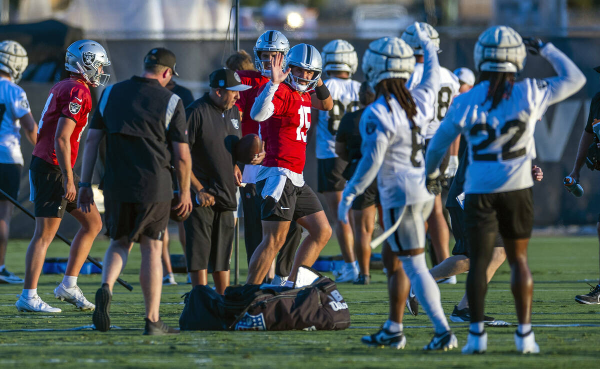 Raiders quarterback Gardner Minshew (15) waves to teammates during practice at the Intermountai ...