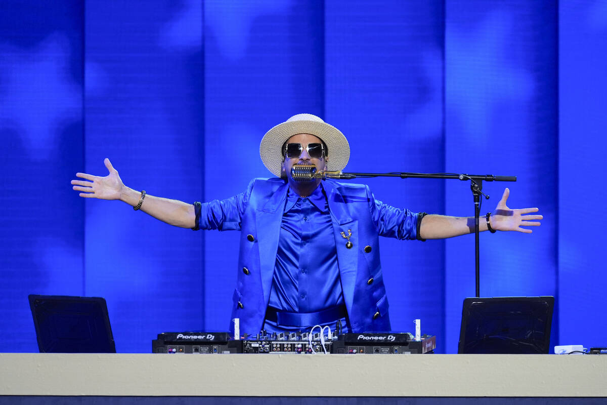 DJ Cassidy speaks during Roll Call at the Democratic National Convention Tuesday, Aug. 20, 2024 ...