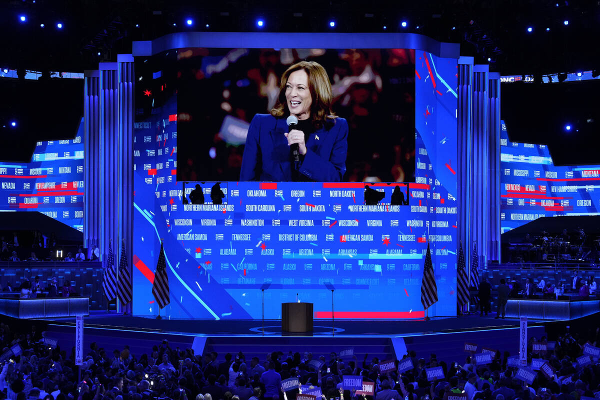 Democratic presidential nominee Vice President Kamala Harris is seen on a video monitor after t ...