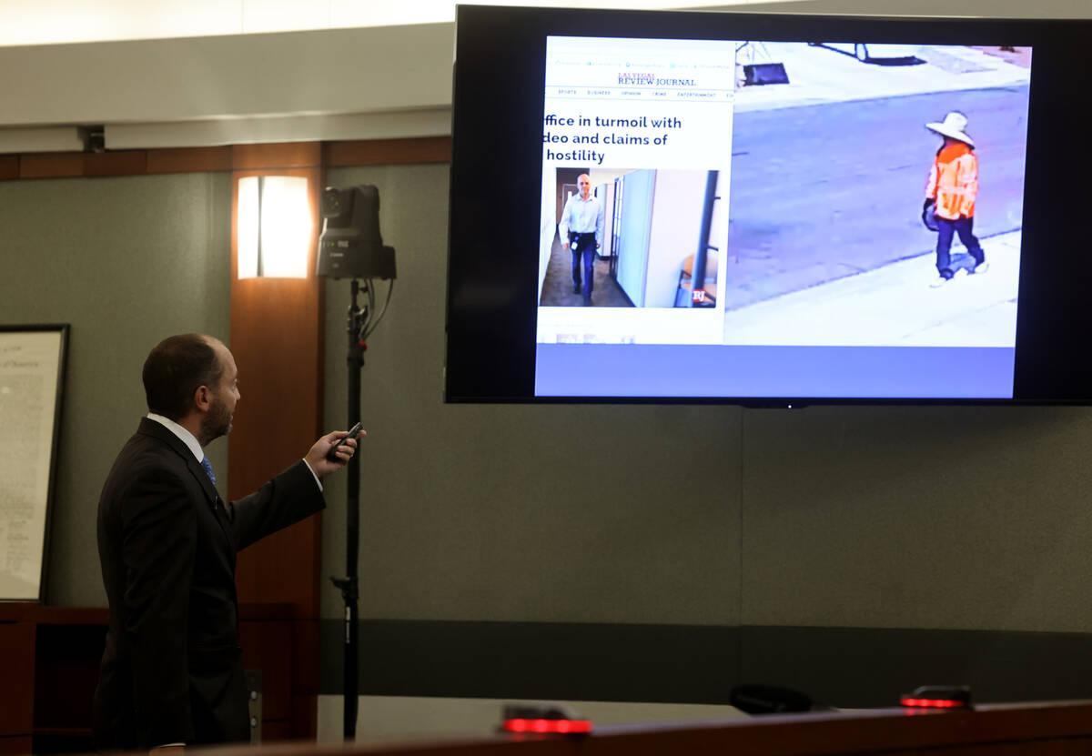 Chief Deputy District Attorney Christopher Hamner shows video of Robert Telles walking, left, a ...