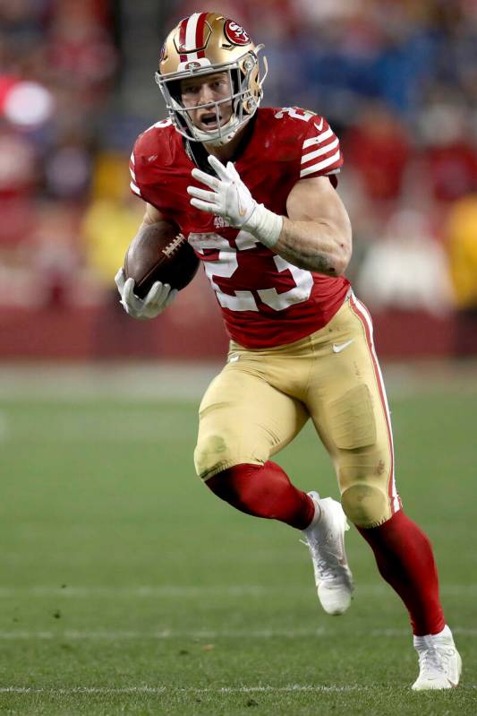 San Francisco 49ers running back Christian McCaffrey (23) runs during the NFC Championship NFL ...