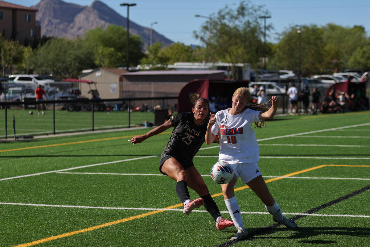 Faith Lutheran’s Riley Renteria (25) passes the ball while Bishop Gorman’s Grace ...