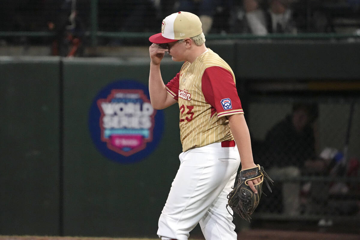 Henderson, Nev.'s Oliver Johnson reacts himself after giving up a solo home run to Lake Mary, F ...