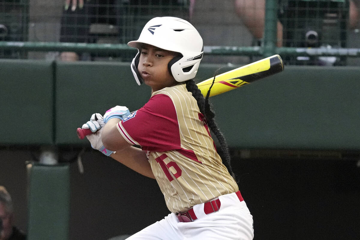 Henderson, Nev.'s Noah Letalu drives in a run with a single off Lake Mary, Fla.'s Lathan Norton ...