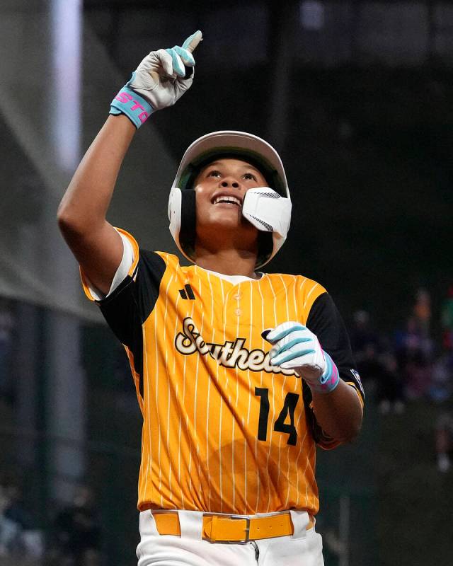 Lake Mary, Fla.'s. James Feliciano celebrates as he crosses home plate after hitting a solo hom ...