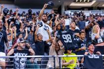 Raiders fans cheer for the team during an open practice at Allegiant Stadium on Tuesday, Aug. 2 ...