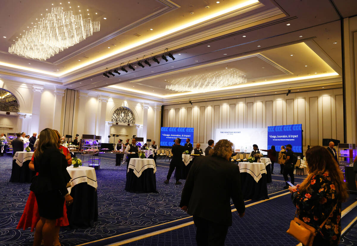 Guests attend the opening of the Venetian Resort Las Vegas new conference center, which is part ...