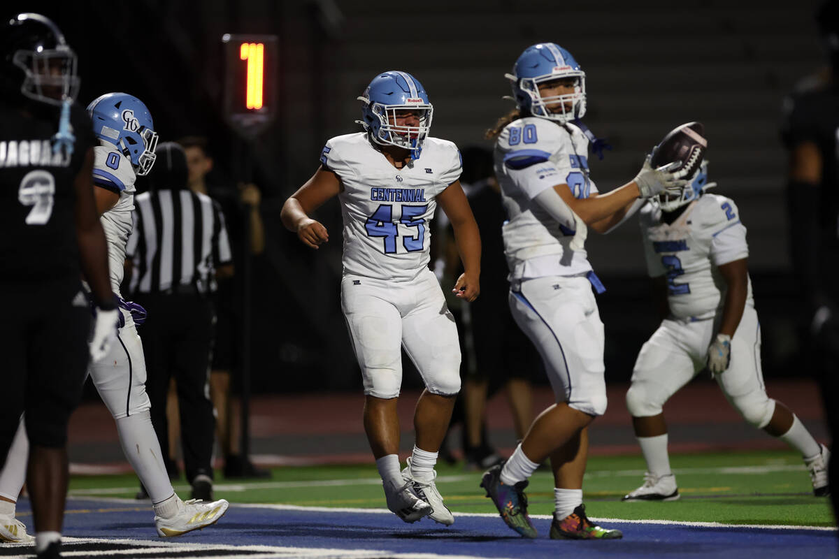 Centennial running back Kolten Silbernagel (45) celebrates after scoring during the second half ...