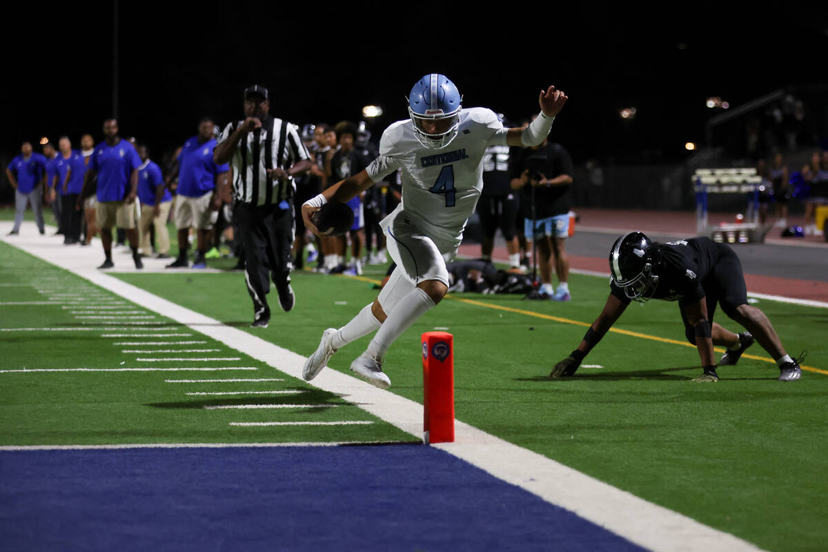 Centennial quarterback Ashton Hunt (4) steps out of bounds just before the end zone during the ...