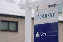 FILE - A for rent sign stands outside a single-family home on the market Saturday, Feb. 10, 202 ...