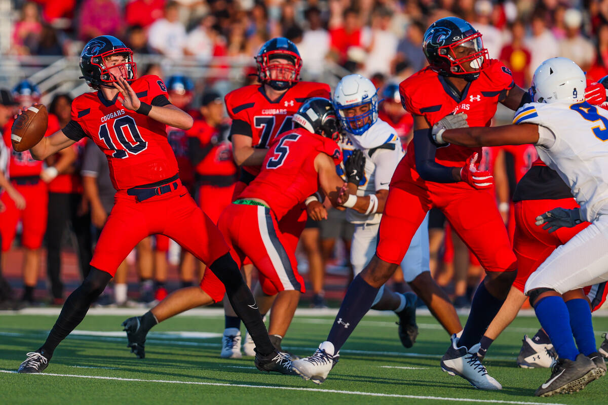 Coronado quarterback Aiden Krause (10) looks to pass the ball during a football game between Co ...