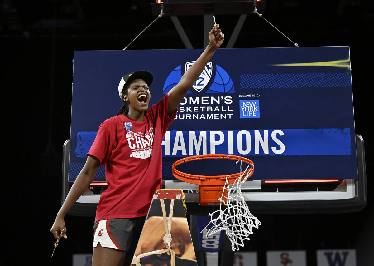 Washington State center Bella Murekatete celebrates after the team defeated UCLA in an NCAA col ...