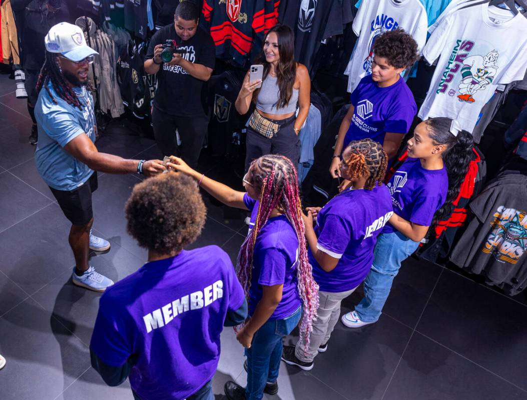 Raiders running back Alexander Mattison has some fun with teens from the Boys & Girls Clubs ...