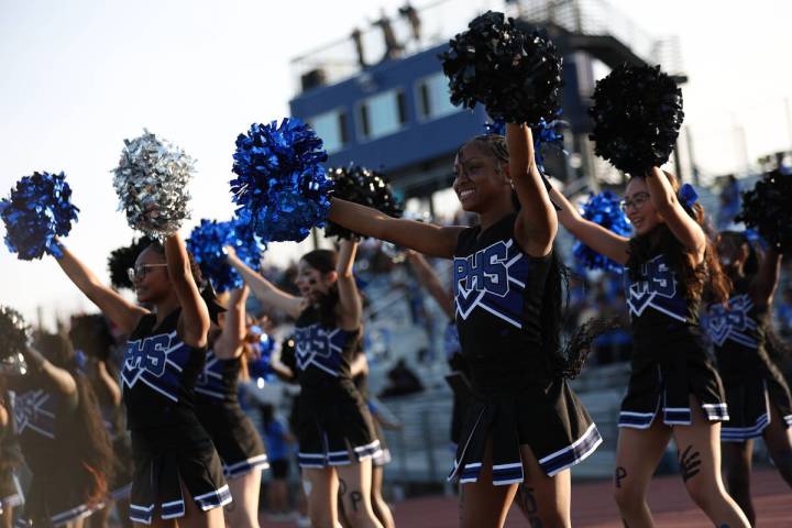 Desert Pines cheerleaders celebrate as their team kicks a field goal during the first half of a ...