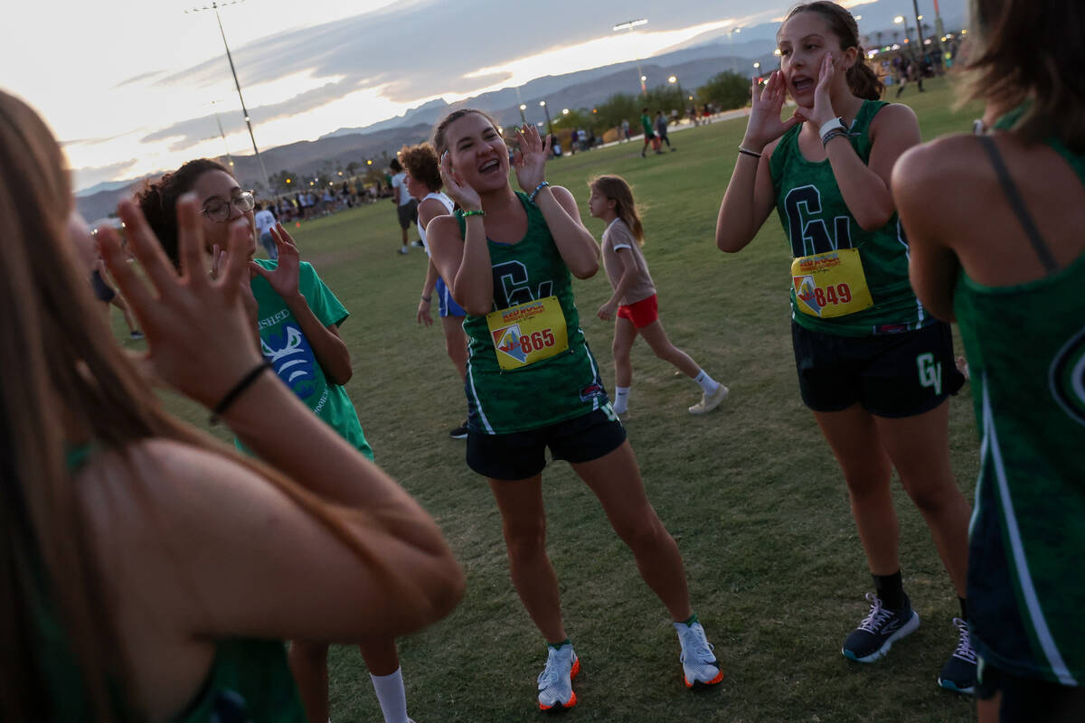 Green Valley’s Lola DeCania, center, leads a cheer before her team competes in the Red R ...