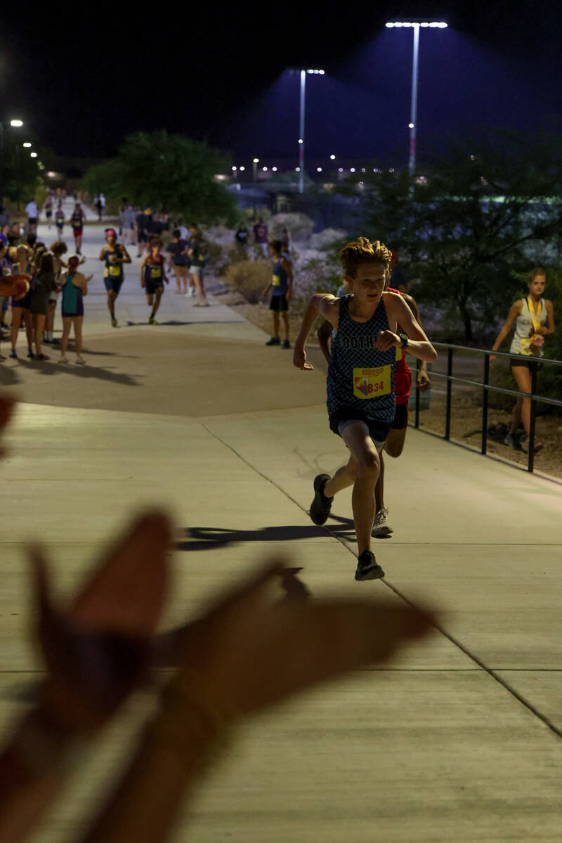 Foothill’s Reed Richards powers through the last steps of the Red Rock Running Company I ...