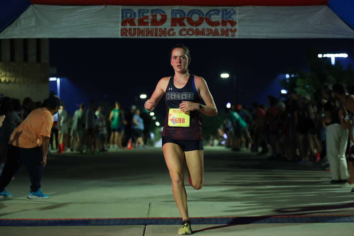 Coronado’s Brooke-Lynn Miller crosses the finish line during the Red Rock Running Compan ...