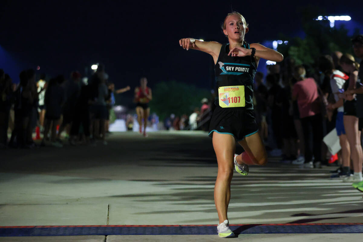 Sky Pointe’s Mackenzie Teal crosses the finish line during the Red Rock Running Company ...